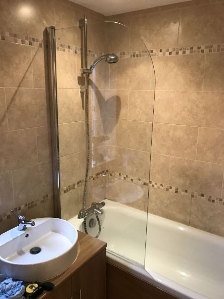 Photo of a renovated shower and sink completed by MG Property Services